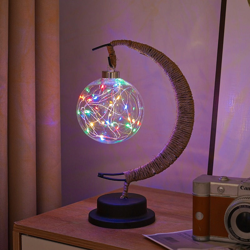 Lampe lunaire en verre éteinte, montrant sa texture