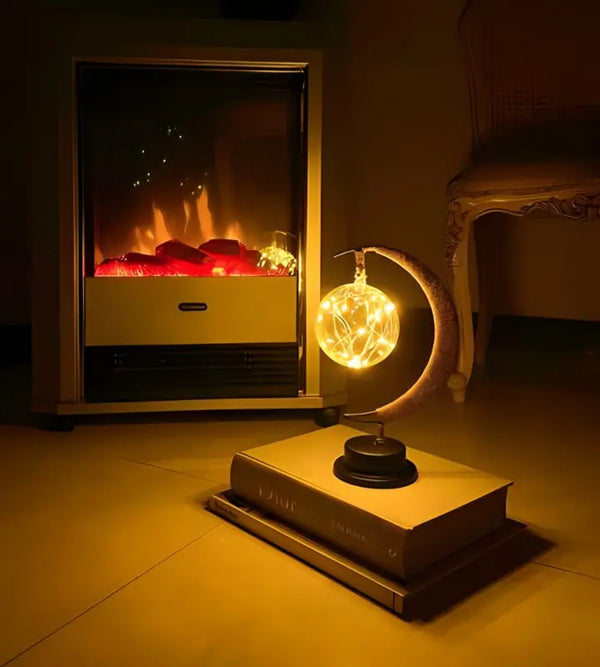 Vue latérale de la lampe lunaire avec son socle en verre