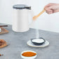 Moulin électrique compact en acier inoxydable sur un plan de travail
