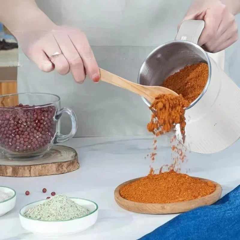 Vue rapprochée du mécanisme de broyage du moulin à grains
