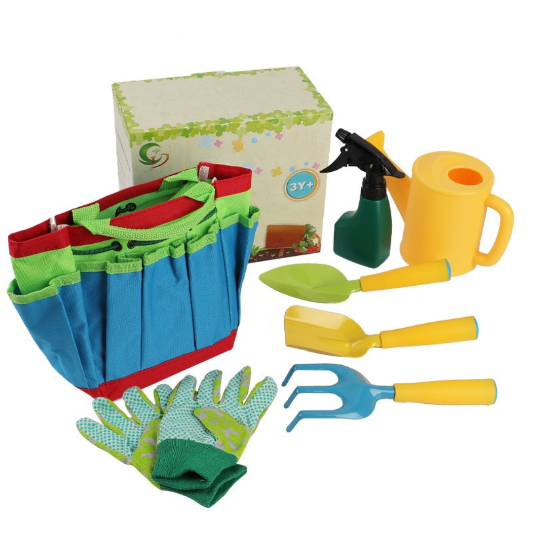 Outils de jardinage pour enfants en action dans un bac à sable
