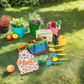 Pelle et râteau en plastique coloré adaptés aux petites mains