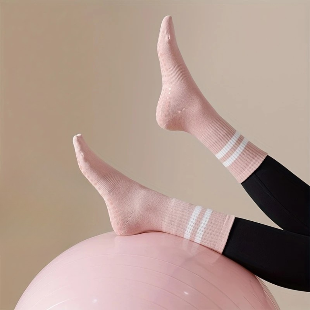 Gros plan sur semelle antidérapante de chaussettes de Pilates