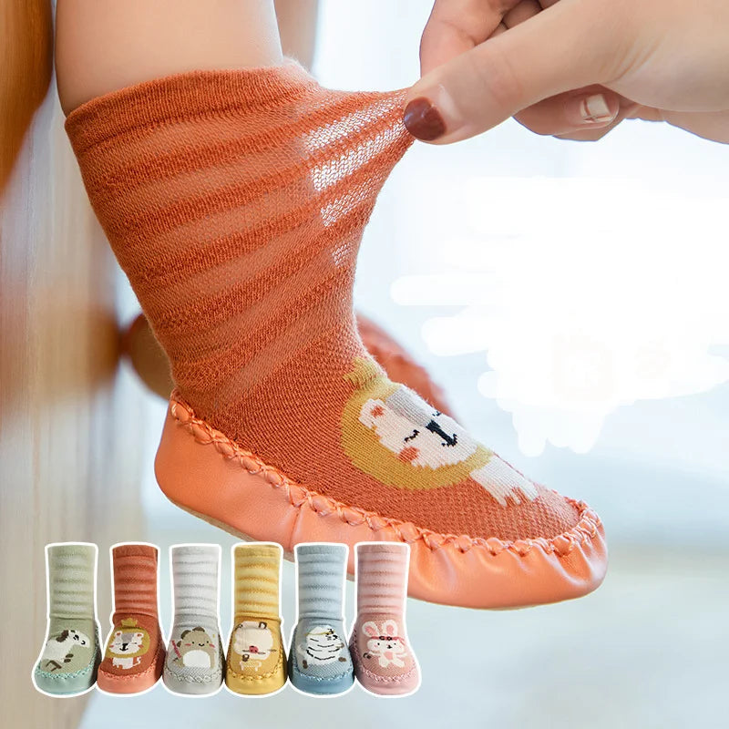 Chaussettes bébé avec motif lion et semelle antidérapante