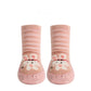 Motif girafe sur chaussettes bébé, semelle en caoutchouc