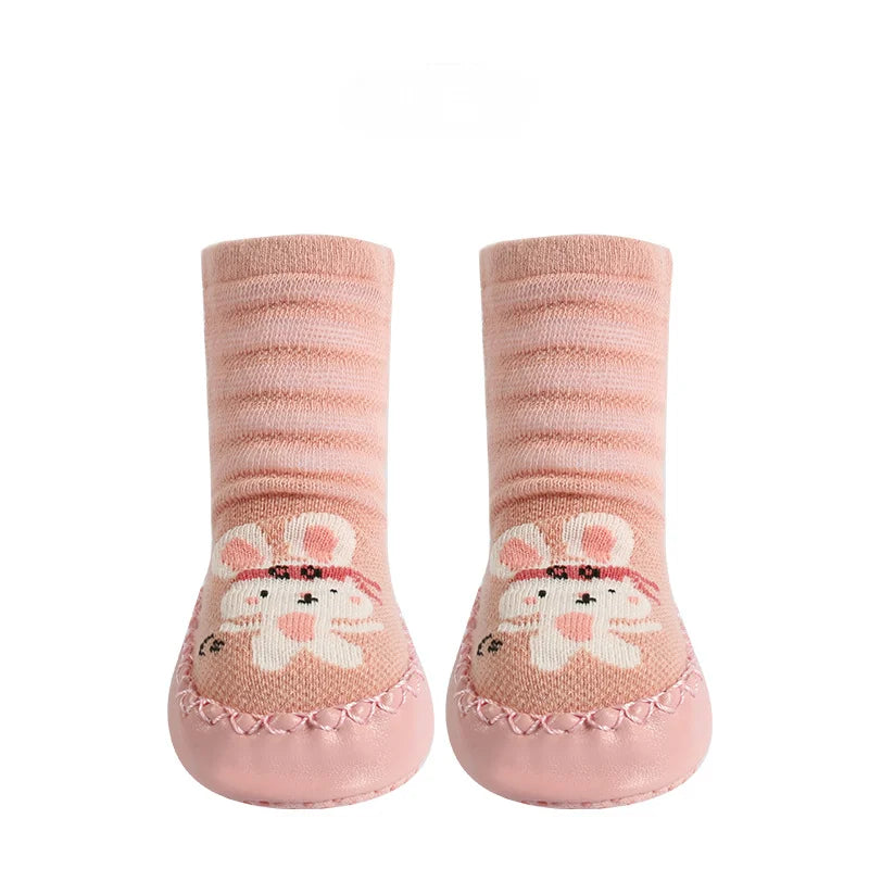 Motif girafe sur chaussettes bébé, semelle en caoutchouc