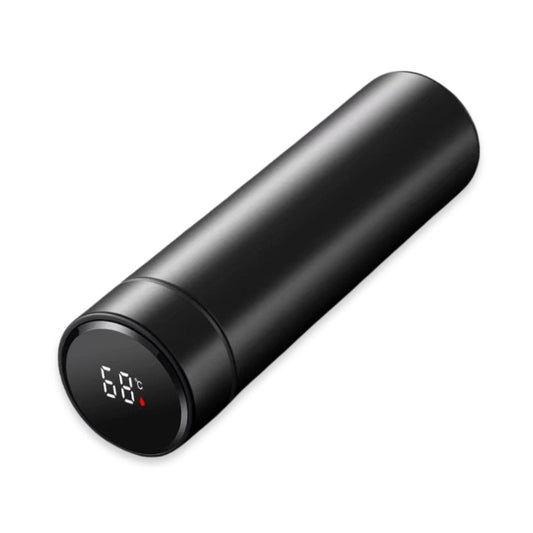 Bouteille thermos posée sur une table en bois
