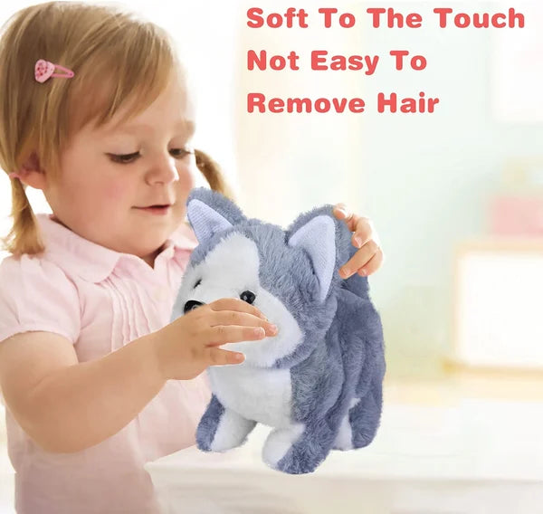 Chien jouet réagissant à un son, oreilles dressées