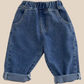 Jeans enfant abricot, coupe ample, cinq poches
