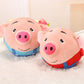Cochon interactif en peluche sautant sur un tapis