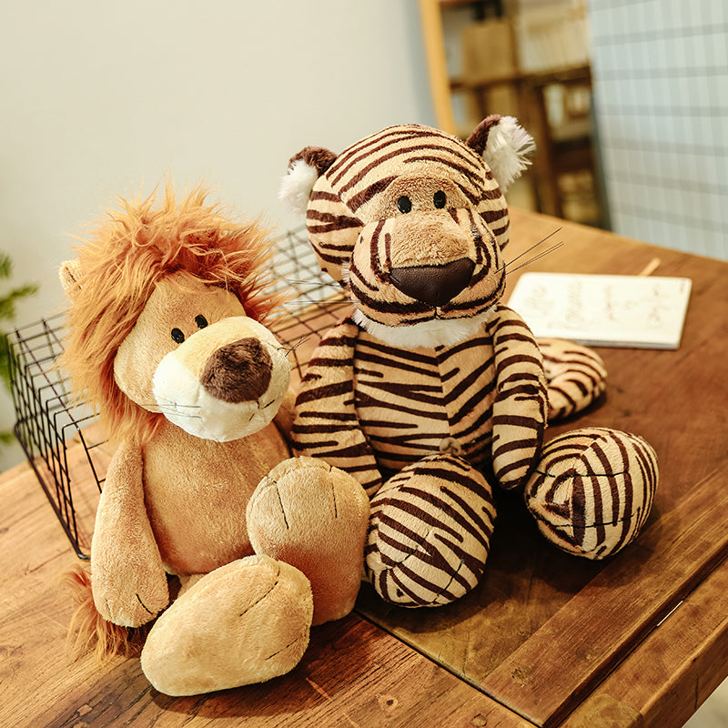 Éléphant en peluche gris avec grandes oreilles