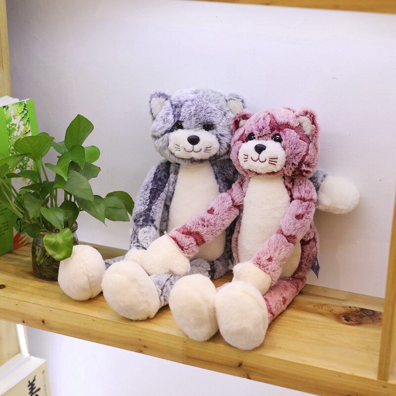 Chat en peluche Kawaii tenant une petite étoile en tissu