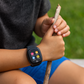 Interface utilisateur de la montre enfant montrant des jeux éducatifs