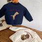 Veste blanche enfant avec broderie chien et texte 'Uniforme de tous les jours'