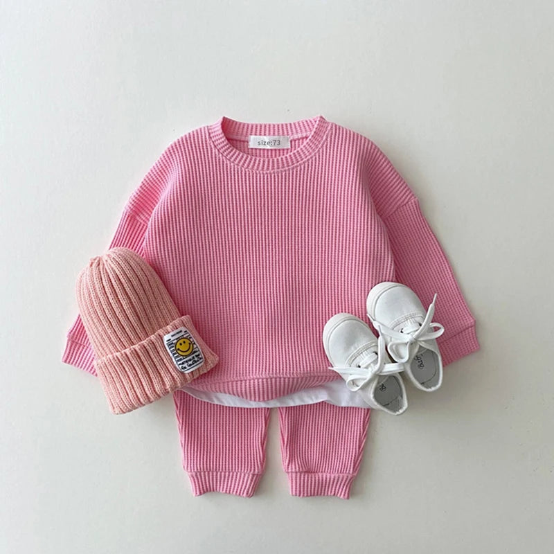 Vue de dos de l'ensemble enfant en coton gaufre, couleur bleue