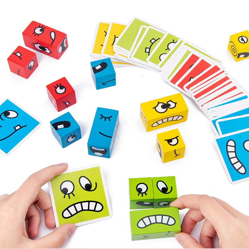 Gros plan sur des blocs en bois avec différentes expressions faciales