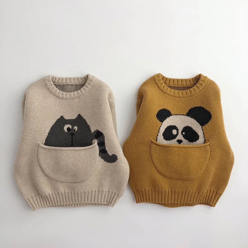 Détail de la poche avant du hoodie animal
