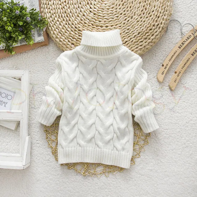 Pull enfant en tricot torsadé, couleur bleu marine