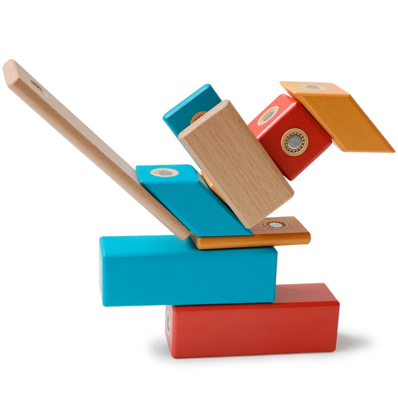 Enfants jouant avec blocs magnétiques en bois colorés