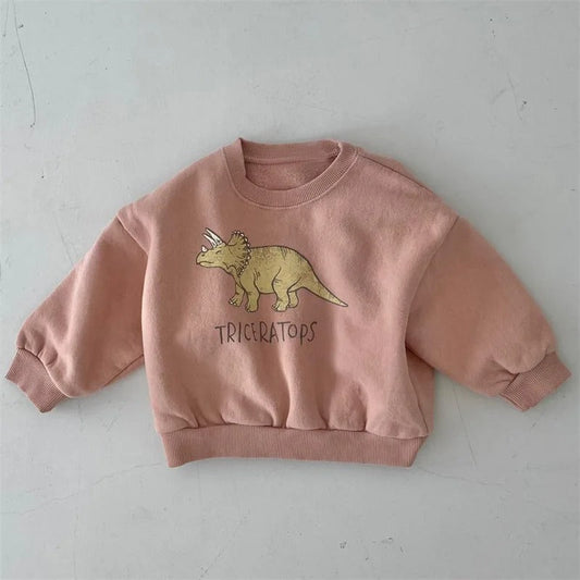 Zoom sur le col du sweat dinosaure en coton confortable