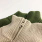 Enfant portant un hoodie zippé, couleur vive
