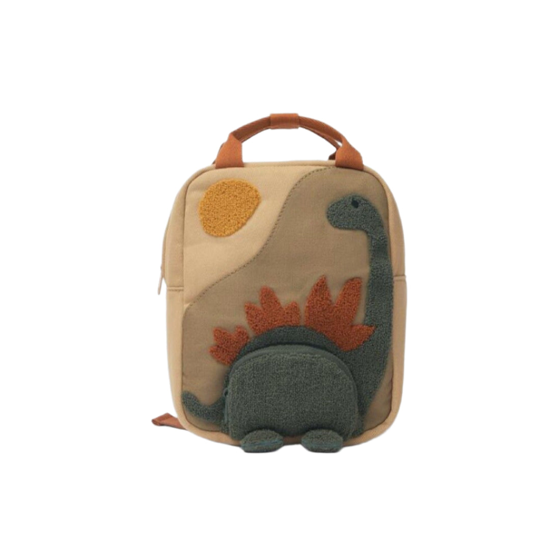Sac à dos ouvert avec jouets et livres à l'intérieur