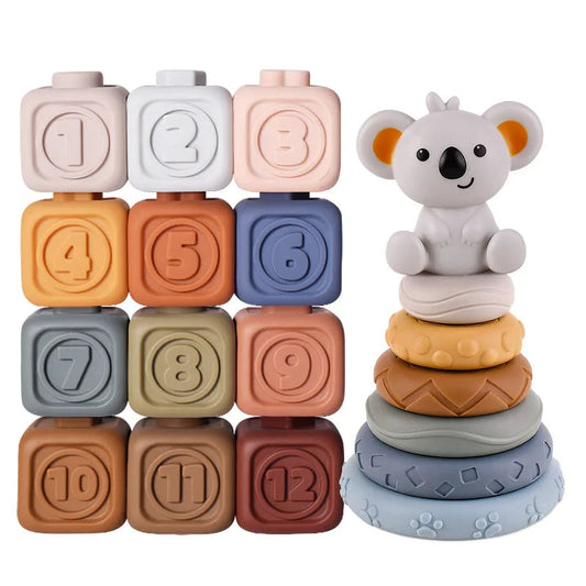 Bébé explorant des blocs de construction en silicone sur le sol