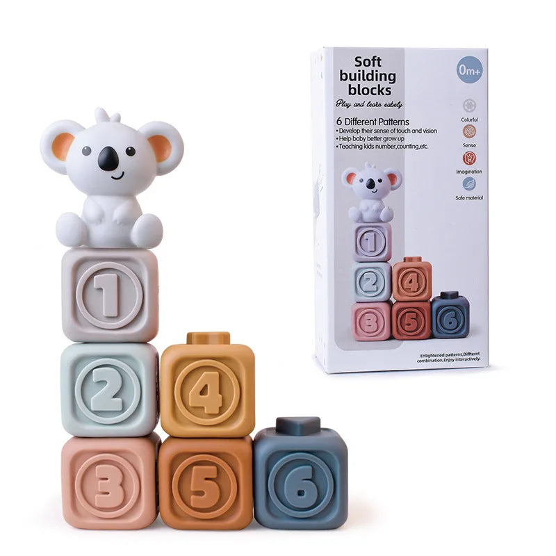 Enfant jouant avec des blocs de construction en silicone doux
