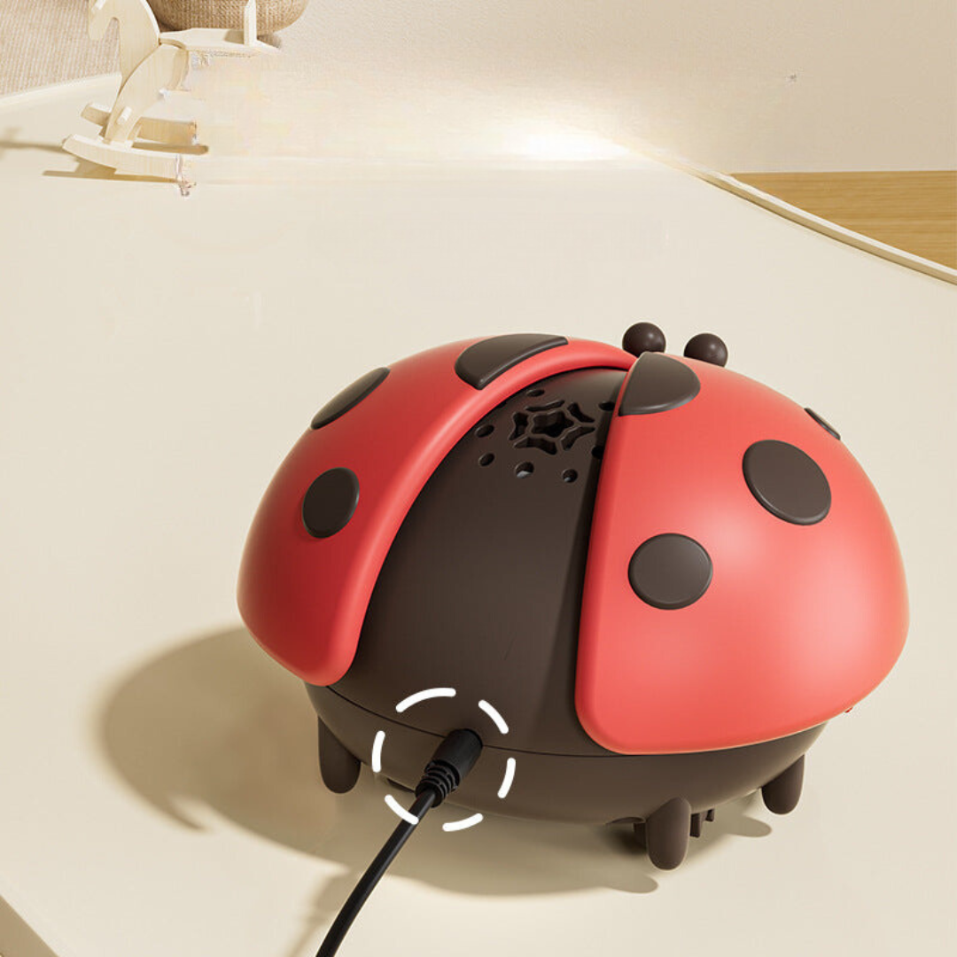 Jouet coccinelle en ballon avec motifs colorés pour bébé
