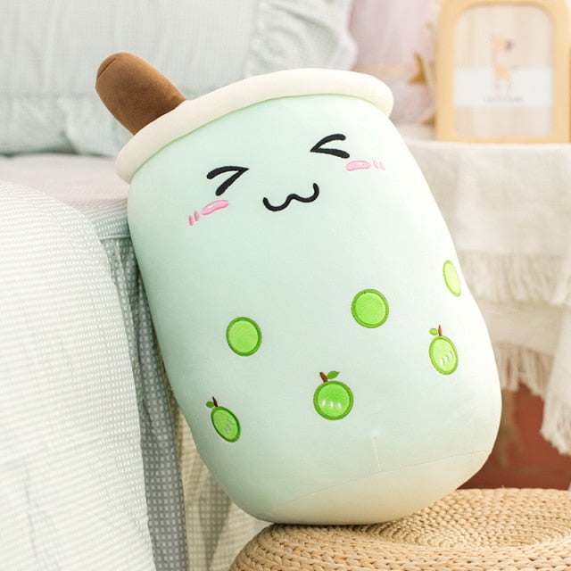 Coussin Bubble Tea avec texture douce et visage rieur