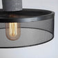 Vue latérale de la lampe montrant le design minimaliste