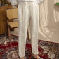 Pantalon vintage avec ceinture, accent sur la taille définie