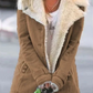 Vue de profil d'un manteau d'hiver avec doublure douce