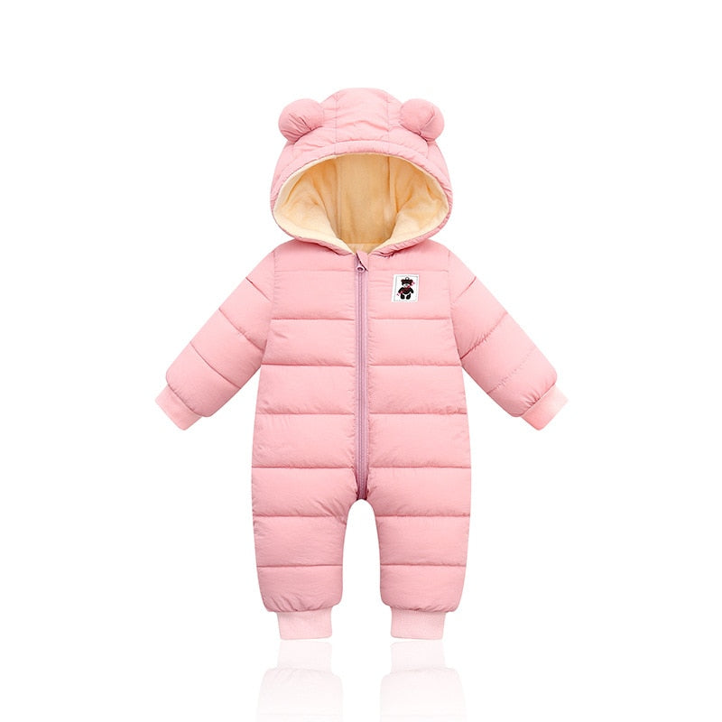 Combinaison bébé avec capuche, posée à plat