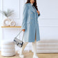 Manteau élégant avec poches latérales visibles