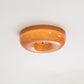 Vue latérale de la lampe encastrée en verre et métal