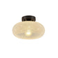 Vue de dessus d'une lampe de plafond en verre transparent
