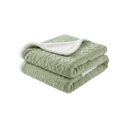 Couverture en fleece utilisée comme jeté décoratif