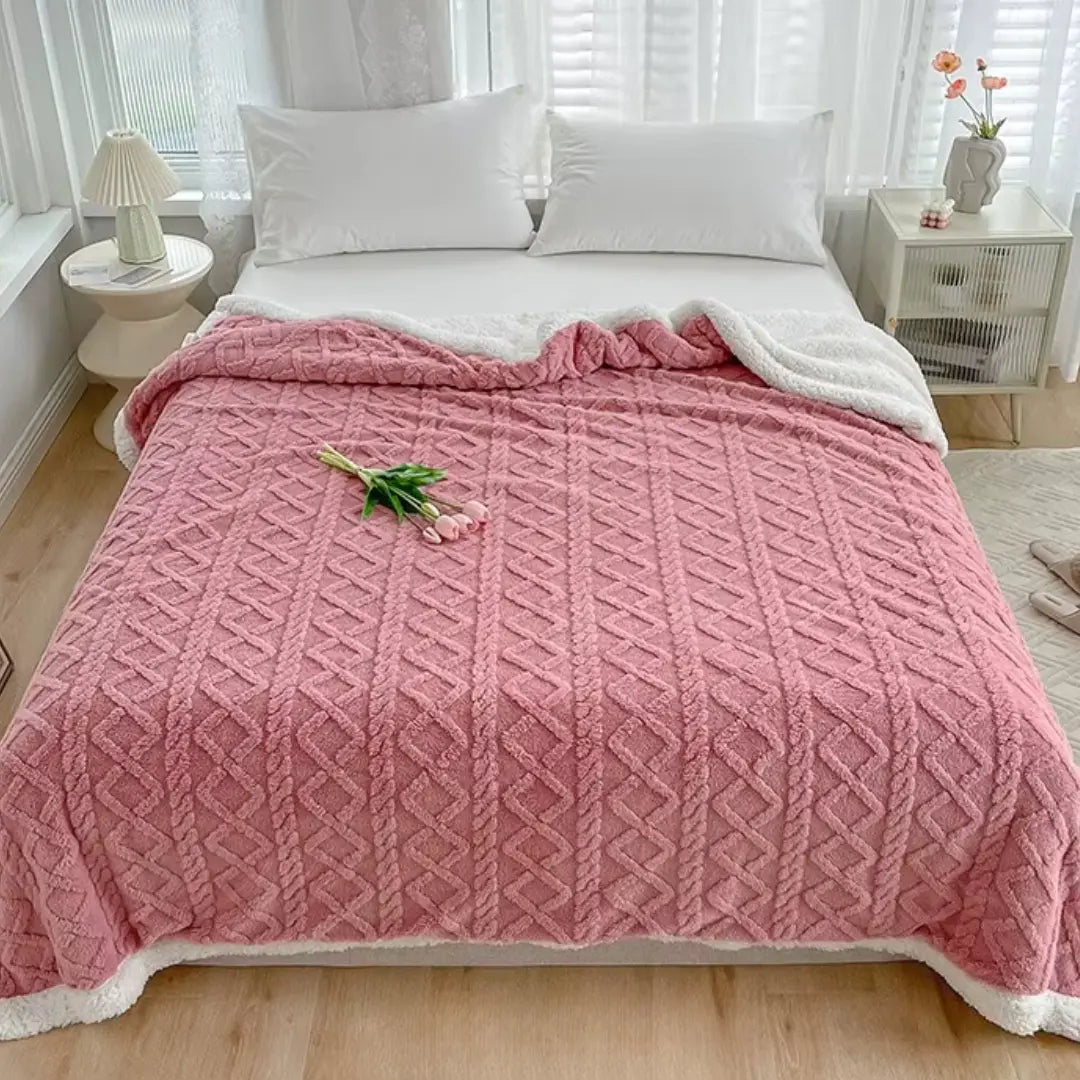 Vue d'ensemble de la couverture sur un fauteuil