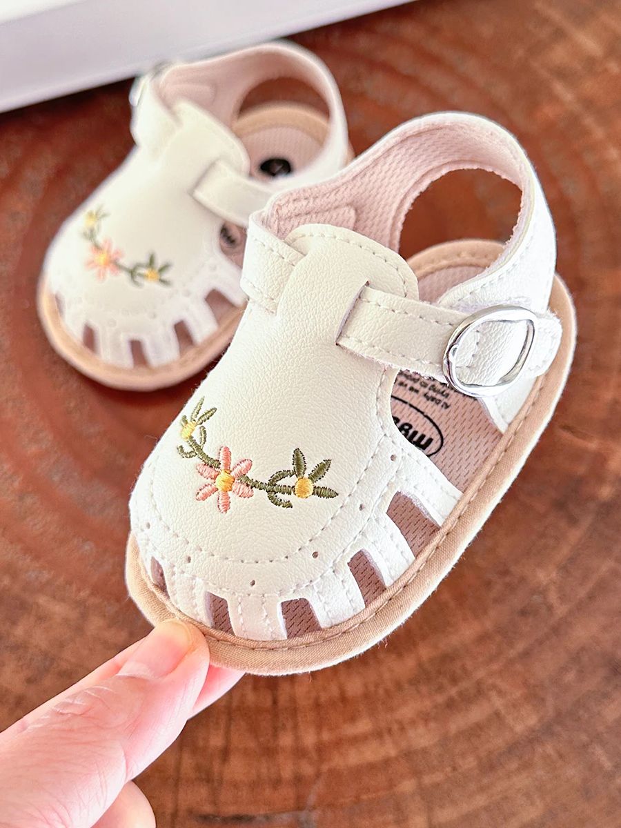 Sandales bébé fille avec broderie florale sur cuir synthétique