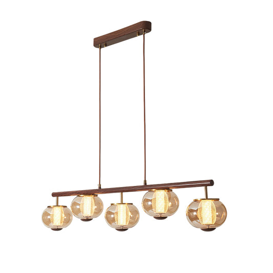 Lampe suspendue créant une atmosphère cozy dans une cuisine moderne