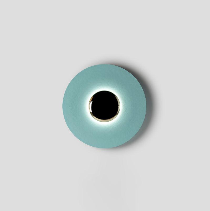 Applique murale ronde en métal orange, design ludique