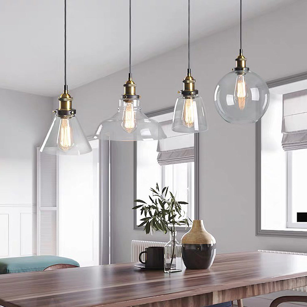 Détail de l'abat-jour en verre gris et support métallique