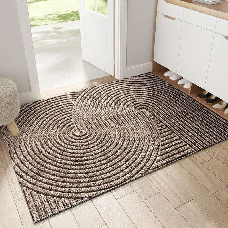 Tapis de porte montrant sa capacité à capturer la saleté