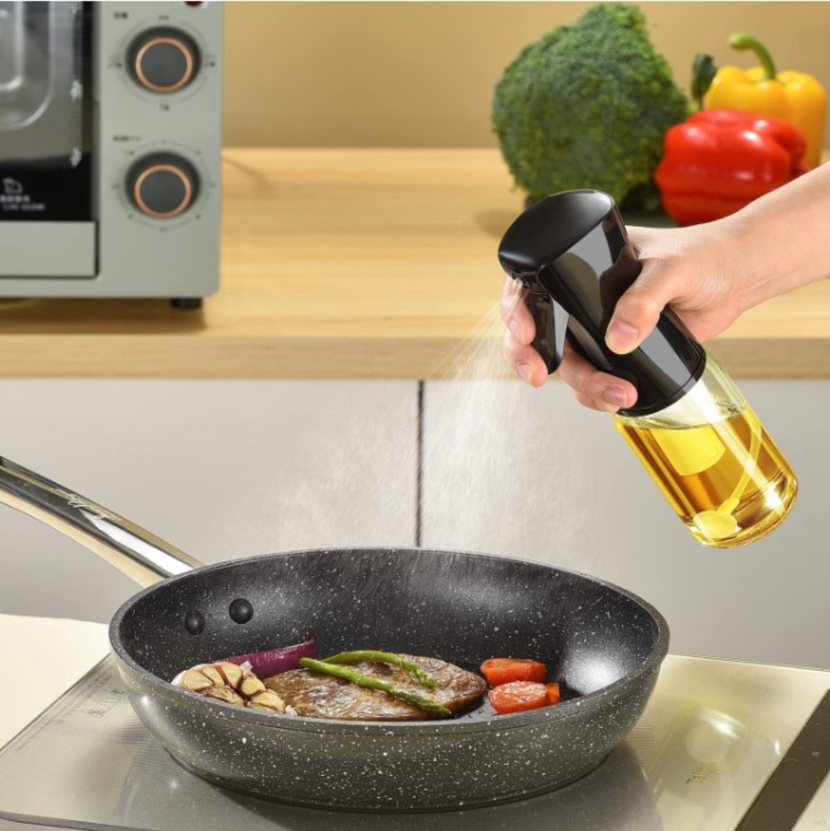 Bouteille en verre pour pulvériser l'huile en cuisine
