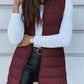 Détail du tissu matelassé et rembourré du gilet long