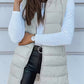Vue arrière du bodywarmer avec coupe oversize et capuche