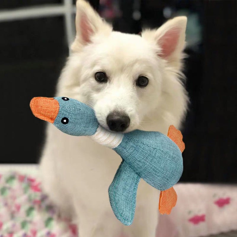 Jouet pour chien durable posé sur une surface en bois