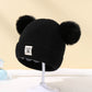 Bonnet d'hiver pour enfant en laine avec pompon