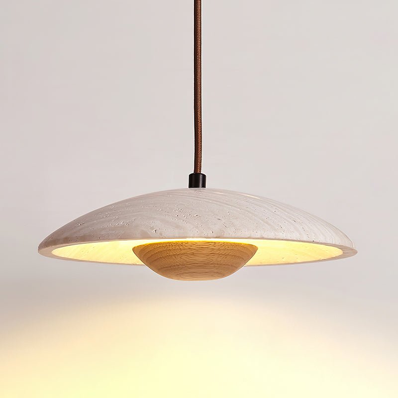 Lampe suspendue au-dessus d'une chambre moderne